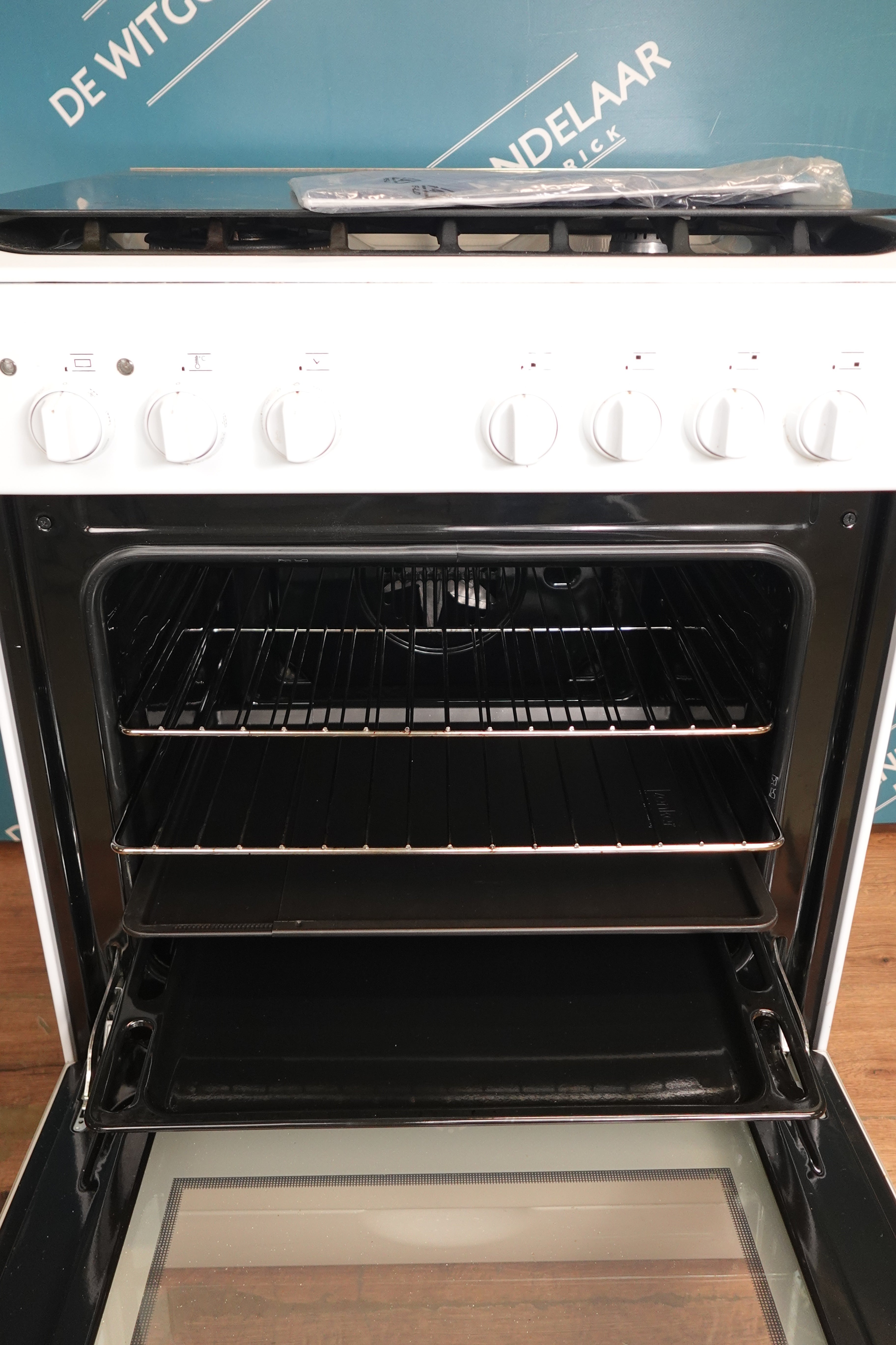 Gasfornuis met elektrische heteluchtoven Indesit